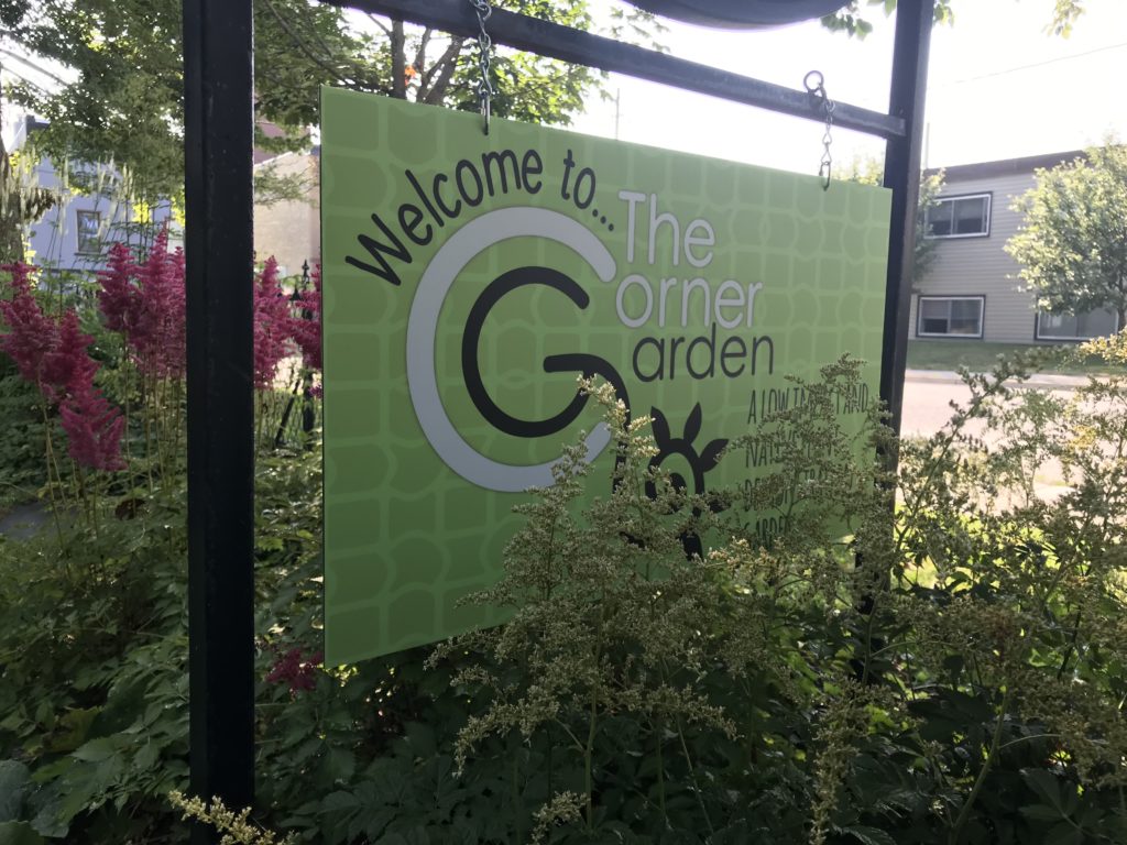 The Corner Garden sign